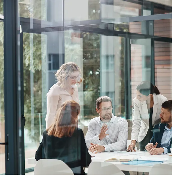 Strategy meeting in bright office architecture